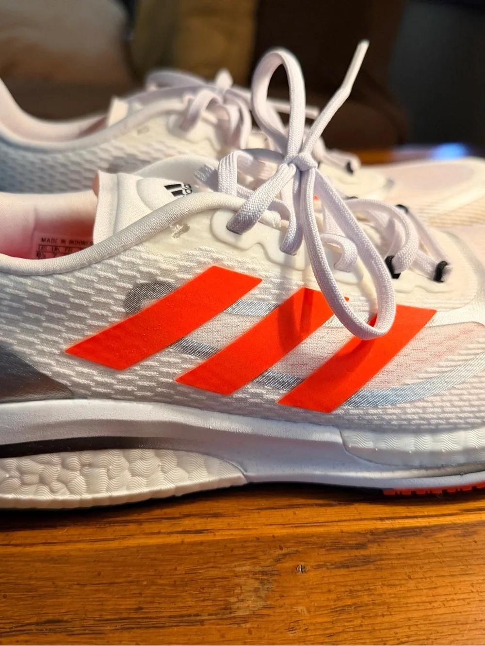 adidas Women’s White Sneakers with Neon Orange Three Stripes